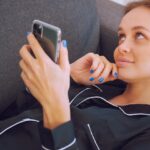 using mobile on the sofa