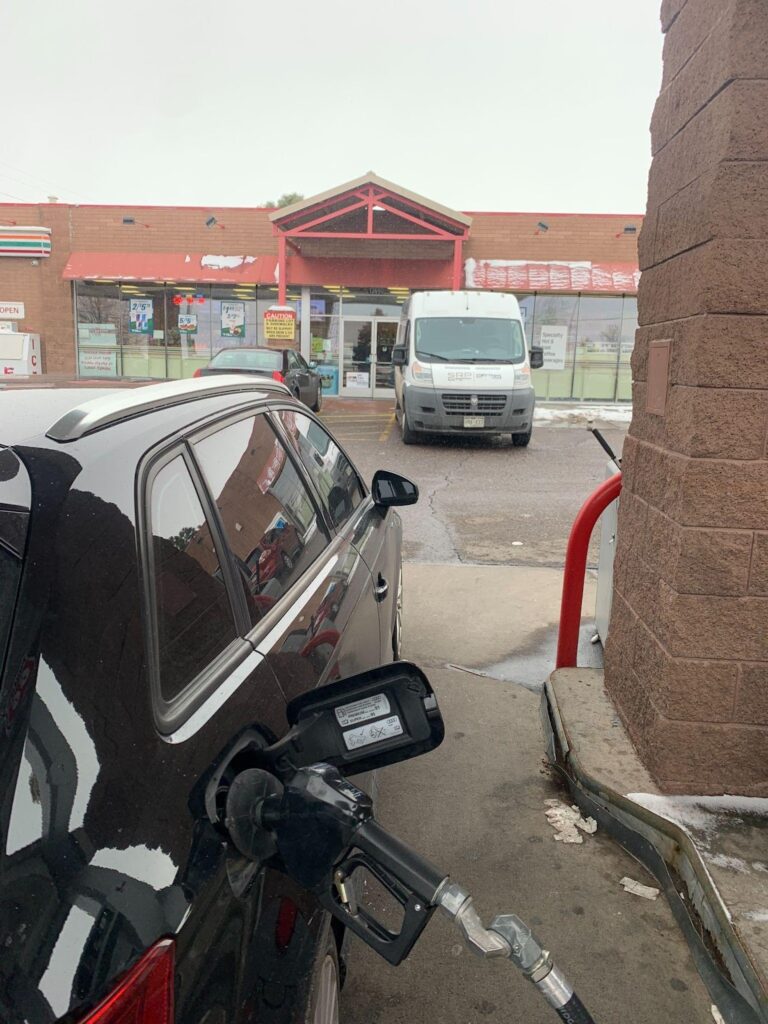 filling my car tank with a gas