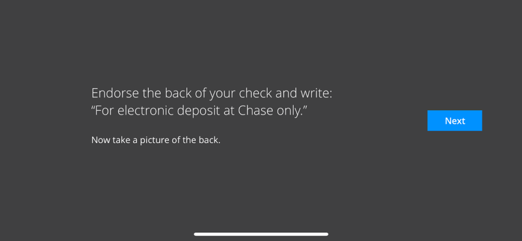 taking a picture of the back of the check