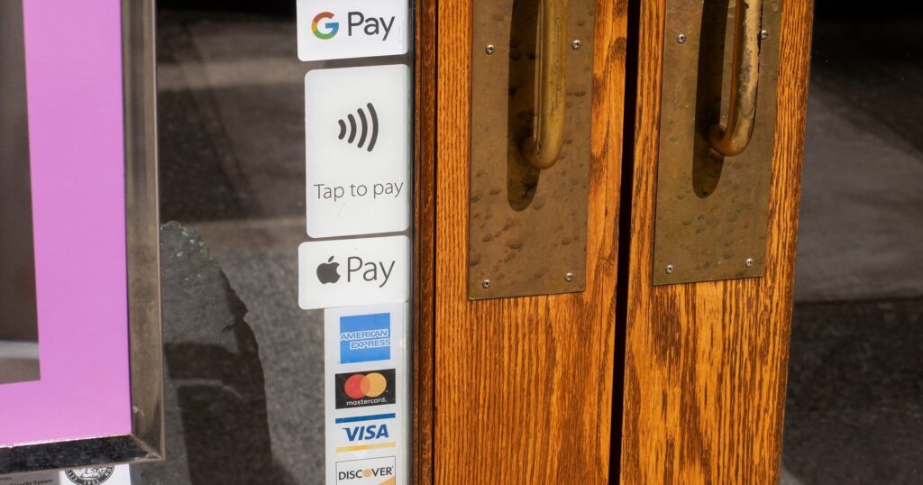 apple pay sign at the restaurant